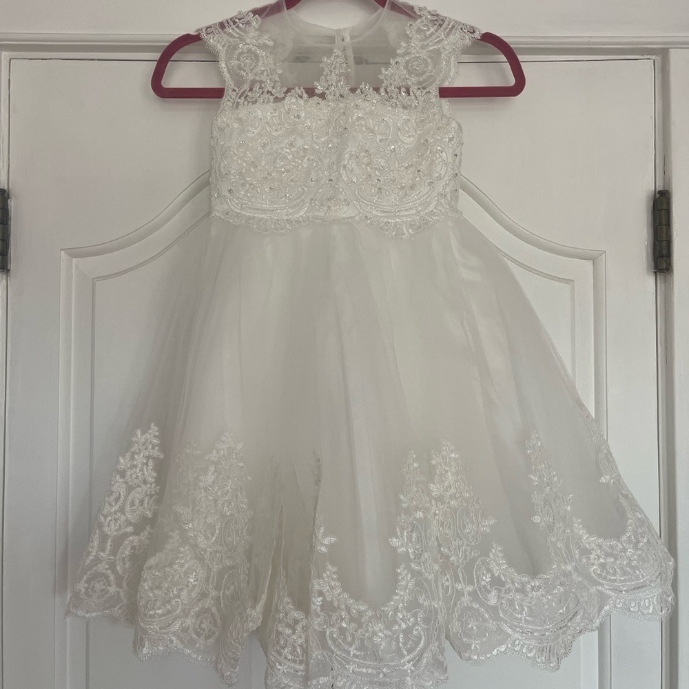 Never worn. Flower girl dresses. We decided to go in a different direction.
